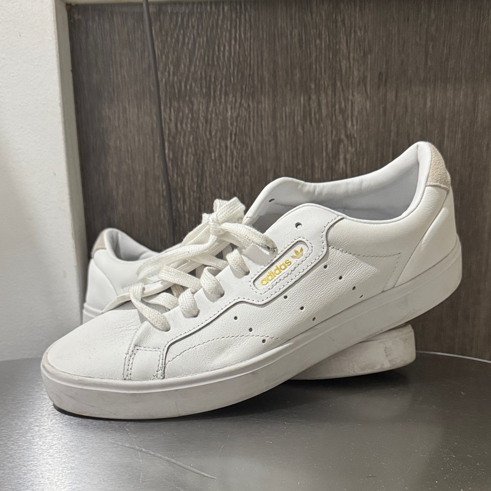 Adidas White Sneakers with Gold Accents